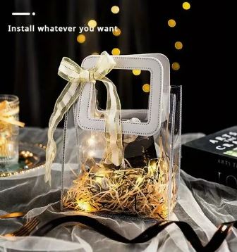 BOLSA ASA CUADRADA CUERINA BLANCO - PVC TRANSPARENTE 17.5x20X9.5