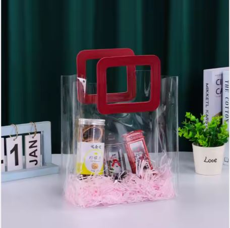 BOLSA ASA CUADRADA CUERINA VINO – PVC TRANSPARENTE 17.5x20X9.5