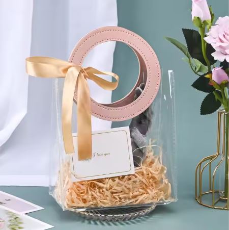 BOLSA ASA REDONDA CUERINA ROSADO - PVC TRANSPARENTE 17.5x20X9.5