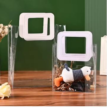 BOLSA ASA CUADRADA CUERINA BLANCO - PVC TRANSPARENTE 24.5x27.5x14