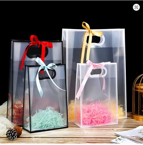 BOLSA TRANSPARENTE BORDE BLANCO 22X30X11 CMS